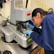 Julissa Larios doctoral candidate in the College of Engineering at the University of Nevada, Reno, uses lab equipment to evaluate asphalt pavement binder made with melted printer toner cartridges