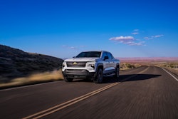 Chevy Silverado EV work truck driving down desert highway