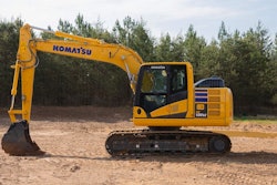 Komatsu PC130LC-11 excavator in dirt field
