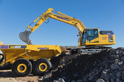 Komatsu's PC210LCE electric excavator filling truck