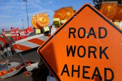 stock image road work ahead orange sign