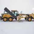 Side view Sany SMG200AWD motor grader in snow