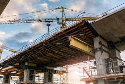 stock image crane over bridge under construction