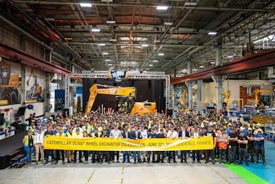 Celebration of 50,000th M318 wheeled excavator
