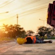 stock image worker lying on ground heat stroke first aid training