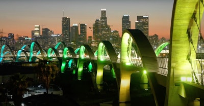 LA Sixth Street Viaduct lighted at Night city in background