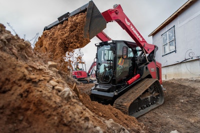 Yanmar TL100VS Compact track loader dumping dirt on pile