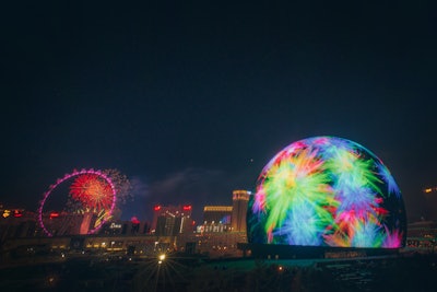 Sphere lit up with colorful splashes of color