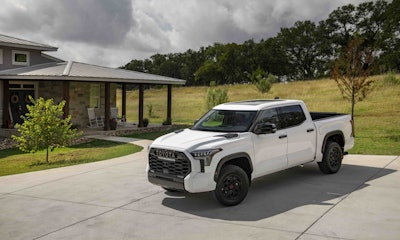 white 2023 Toyota Tundra TRD Pro Super parked on home driveway