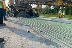 concrete sensors placed under rebar on road project about to be covered by concrete paver