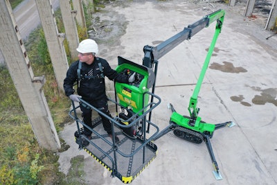 leguan 225 spider lift with worker in platform at raised height