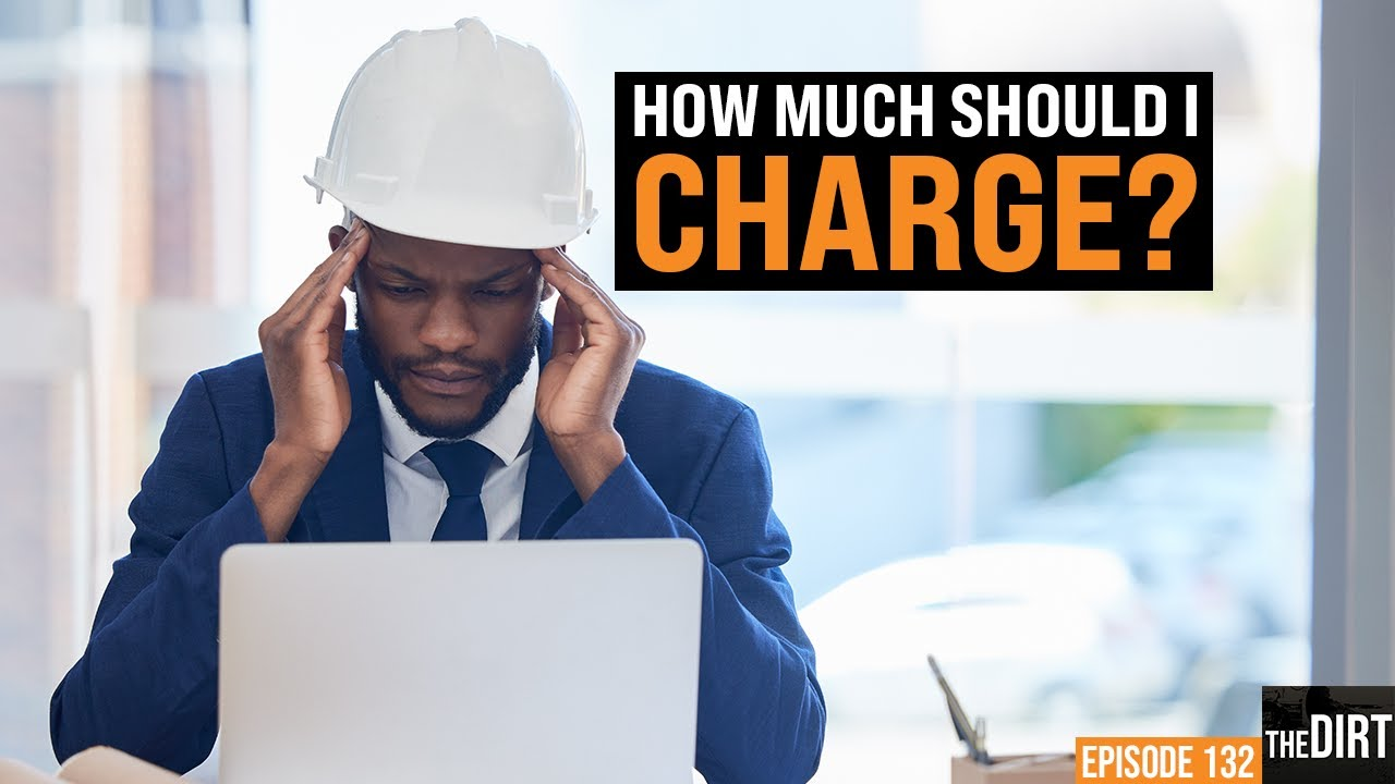 man in a suit wearing a hard hat at a laptop with text overlay that reads: how much should i charge? episode 132 the dirt
