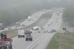 traffic video screen shot of crash of trailer and highway helpers vehicle on side of I-380 in Iowa