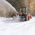 tractor blowing snow with IronCraft snow cannon