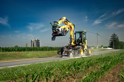 JCB pothole pro planer riding down road
