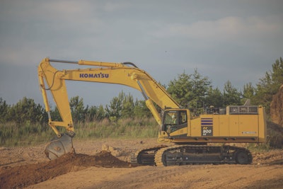 Komatsu PC900LC-11 excavator digging in dirt