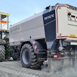 Streumaster SW112 TC binding agent spreader being pulled by tractor