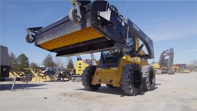 Werk-Brau pickup dump broom raised on skid steer