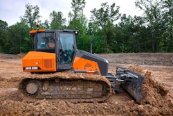 Develon DD130 dozer pushing dirt