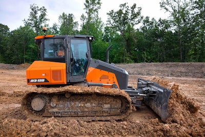 Develon DD130 dozer pushing dirt