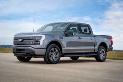 gray 2024 Ford F-150 Lightning Flash parked on road