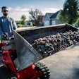 Gravely Axis 100 with load of stones in bucket