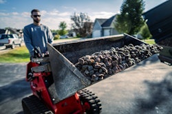 Gravely Axis 100 with load of stones in bucket