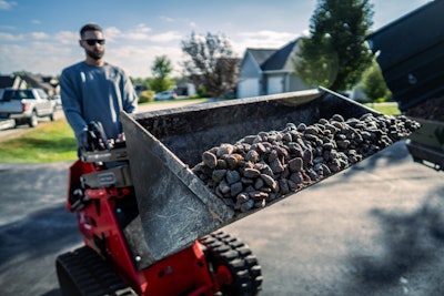 Gravely Axis 100 with load of stones in bucket