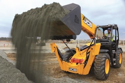 JCB 505-20TC telehandler dumping black dirt