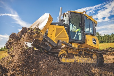 John Deere 450 P-Tier dozer pushing dirt
