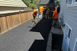 crew paves driveway in Seattle with asphalt made with Modern Hydrogen captured carbon