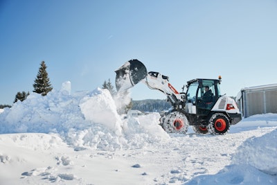 bobcat l95 compact wheel loader dumping snow