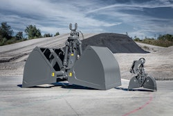 liebherr's largest clamshell GMZ 180B beside small clamshell