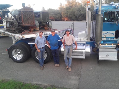 matt veerkamp jim campbell shawn stover with restored 1919 best 25 tractor on tractor trailer