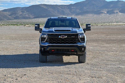 front view 2024 chevrolet silverado hd zr2 desert mountain background