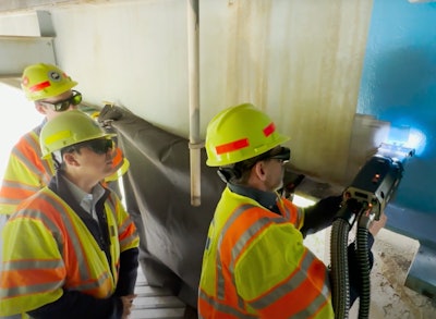 Adapt Laser being used to remove blue paint from bridge beam connecticut