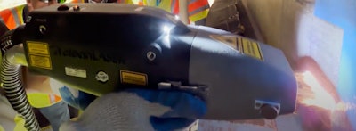 closeup of handheld Adapt Laser connecticut bridge