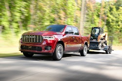 2025 Ram 1500 truck hauling a Case compact track loader