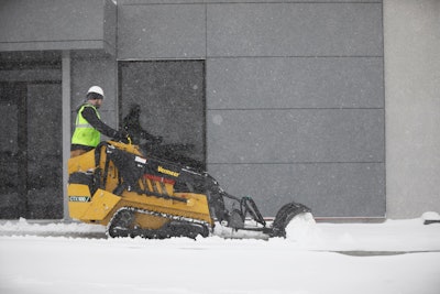 Vermeer CTX100 compact utility loader plowing snow