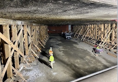 wooden shoring underneath burned I-10 freeway los angeles