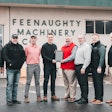 Feenaughty staff accepting 2022 Takeuchi salesman of year award.