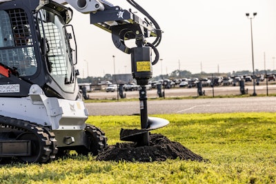 Bobcat auger attachment on a compact track loader