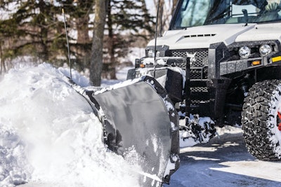 Bobcat snow blade attachment on a UTV