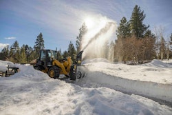 Cat 906 compact wheel loader blowing snow