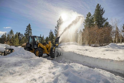 Cat 906 compact wheel loader blowing snow