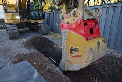Rodradar excavator bucket with ground penetrating radar digs trench