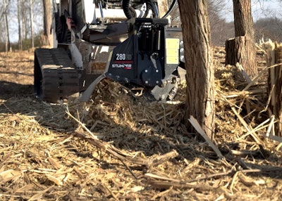 Stumper stump grinding attachment on a compact track loader
