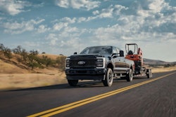 Ford F-Series Super Duty hauling a mini excavator
