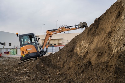 CASE CX26C Mini Excavator digging on dirt pile