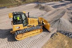 Cat D4 Dozer pushing aggregate